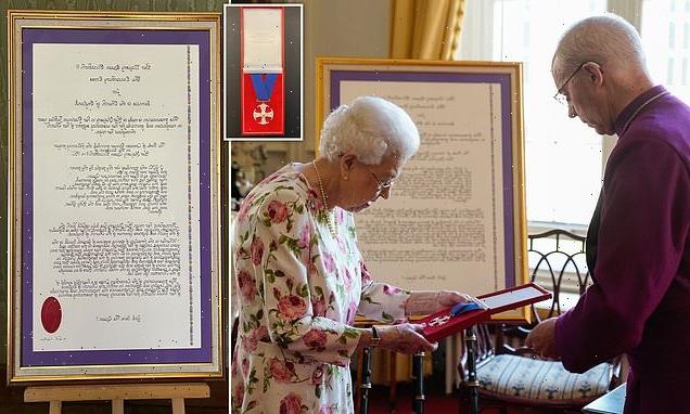 Smiling Queen presented with special Canterbury Cross by Justin Welby