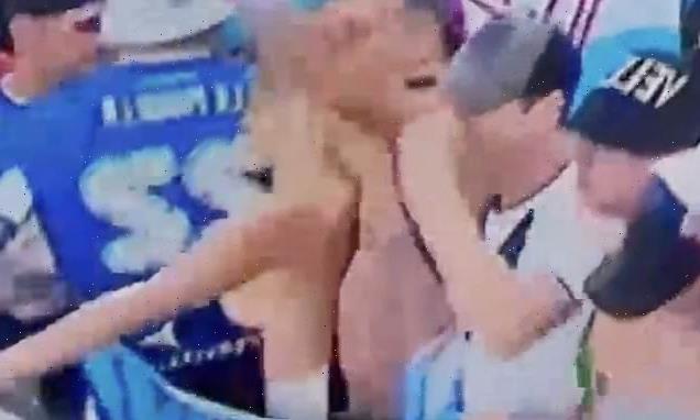 Topless Argentinian fan faces jail in Qatar after stripping off
