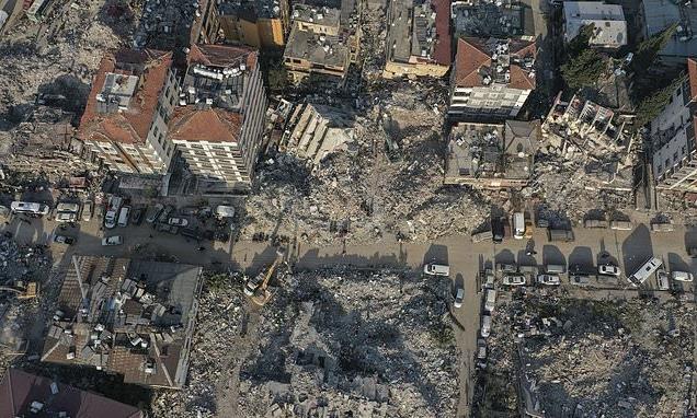 Aerial view over collapsed buildings in Turkey shows devastation Aerial view over collapsed buildings in Turkey shows devastation