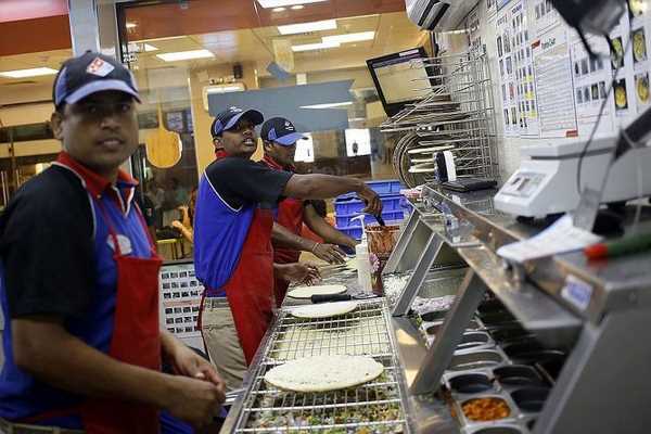 20-min pizza promise by Domino’s gets stuck in traffic, kitchen