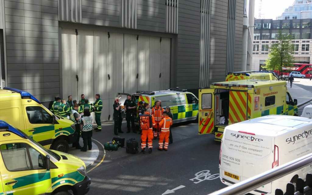 Worker dies 'after being trapped on top floor of office building' as fire fighters and ambulance crews rush to scene | The Sun
