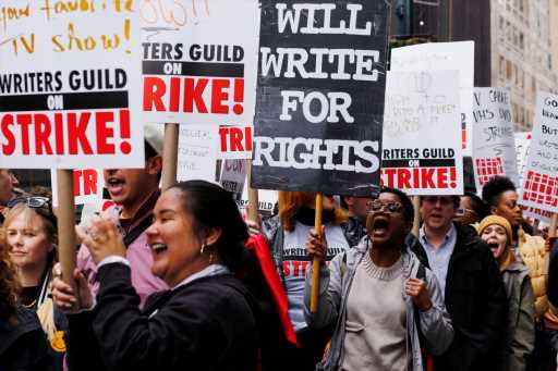 Writers Get Creative With Picket Line Slogans: “What Would Larry David Do?”